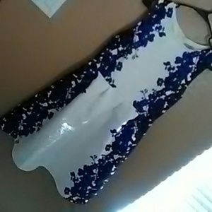 White dress with side flowers design